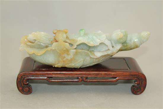 A large Chinese jadeite lotus carving, 20th century, 20.3cm, wood stand